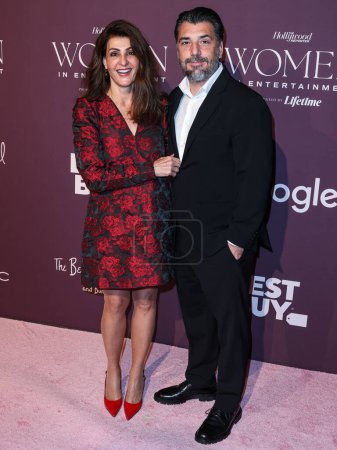 Photo for Canadian actress and screenwriter Nia Vardalos and Spiros Katsagans arrive at The Hollywood Reporter's Women In Entertainment Gala 2023 presented by Lifetime held at The Beverly Hills Hotel on December 7, 2023 in Beverly Hills, Los Angeles - Royalty Free Image