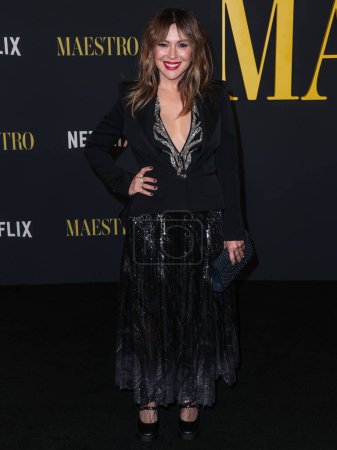 Photo for American actress, producer, activist and former singer Alyssa Milano arrives at the Los Angeles Special Screening Of Netflix's 'Maestro' held at the Academy Museum of Motion Pictures on December 12, 2023 in Los Angeles, California, United States. - Royalty Free Image