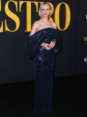 Photo for English actress Carey Mulligan wearing a Celine dress arrives at the Los Angeles Special Screening Of Netflix's 'Maestro' held at the Academy Museum of Motion Pictures on December 12, 2023 in Los Angeles, California, United States. - Royalty Free Image