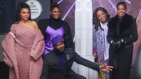 Photo for Taraji P. Henson, Danielle Brooks, Blitz Bazawule, Oprah Winfrey and Fantasia Barrino attend as Oprah Winfrey And The Cast Of Warner Bros.' 'The Color Purple' Light The Empire State Building PURPLE to celebrate the 2023 film's release on December 12 - Royalty Free Image