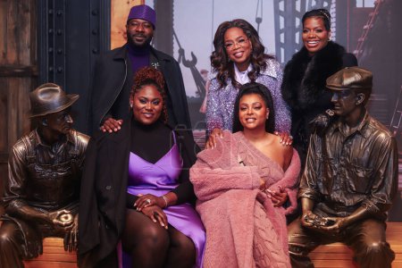 Photo for Danielle Brooks, Blitz Bazawule, Fantasia Barrino, Taraji P. Henson and Oprah Winfrey attend as Oprah Winfrey And The Cast Of Warner Bros.' 'The Color Purple' Light The Empire State Building PURPLE to celebrate the 2023 film's release on December 12 - Royalty Free Image