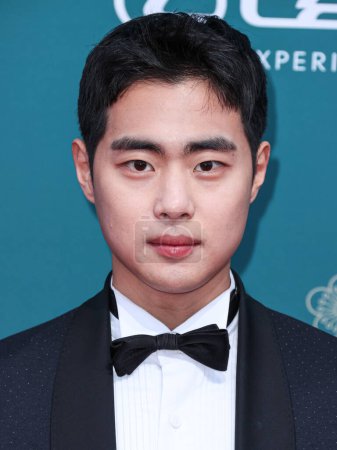 Photo for South Korean actor Jo Byeong-kyu arrives at the 21st Annual Unforgettable Gala Asian American Awards held at The Beverly Hilton Hotel on December 16, 2023 in Beverly Hills, Los Angeles, California, United States. - Royalty Free Image