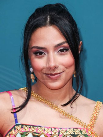 Photo for American YouTuber, television host, actress and a former professional cyclist Michelle Khare arrives at the 21st Annual Unforgettable Gala Asian American Awards held at The Beverly Hilton Hotel on December 16, 2023 in Beverly Hills, Los Angeles - Royalty Free Image