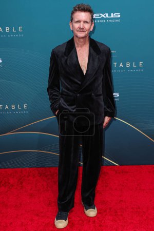 Photo for French-American actor Sebastian Roche arrives at the 21st Annual Unforgettable Gala Asian American Awards held at The Beverly Hilton Hotel on December 16, 2023 in Beverly Hills, Los Angeles, California, United States. - Royalty Free Image