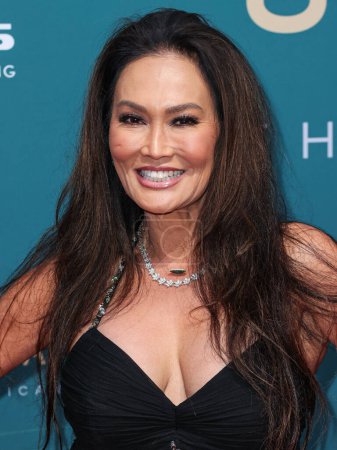 Photo for American actress and singer Tia Carrere arrives at the 21st Annual Unforgettable Gala Asian American Awards held at The Beverly Hilton Hotel on December 16, 2023 in Beverly Hills, Los Angeles, California, United States. - Royalty Free Image