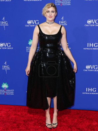 Photo for Greta Gerwig arrives at the 35th Annual Palm Springs International Film Festival Film Awards held at the Palm Springs Convention Center on January 4, 2024 in Palm Springs, Riverside County, California, United States. - Royalty Free Image