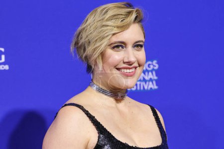 Photo for Greta Gerwig arrives at the 35th Annual Palm Springs International Film Festival Film Awards held at the Palm Springs Convention Center on January 4, 2024 in Palm Springs, Riverside County, California, United States. - Royalty Free Image