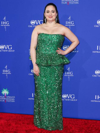 Photo for Lily Gladstone wearing a custom Rodarte dress arrives at the 35th Annual Palm Springs International Film Festival Film Awards held at the Palm Springs Convention Center on January 4, 2024 in Palm Springs, Riverside County, California, United States. - Royalty Free Image