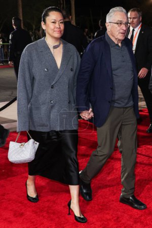 Photo for Tiffany Chen and boyfriend Robert De Niro arrive at the 35th Annual Palm Springs International Film Festival Film Awards held at the Palm Springs Convention Center on January 4, 2024 in Palm Springs, Riverside County, California, United States. - Royalty Free Image