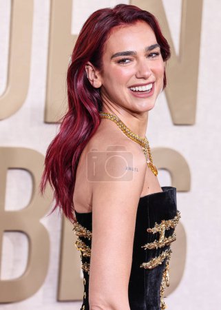 Photo for Dua Lipa wearing a custom Schiaparelli dress, Jimmy Choo shoes and Tiffany and Co. jewelry arrives at the 81st Annual Golden Globe Awards held at The Beverly Hilton Hotel on January 7, 2024 in Beverly Hills, Los Angeles, California, United States. - Royalty Free Image