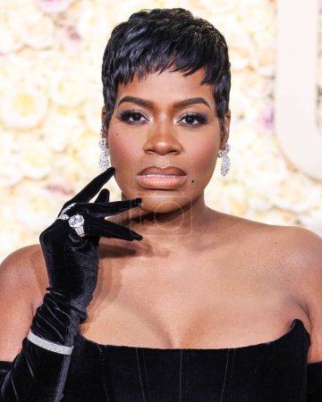 Photo for Fantasia Barrino wearing a Dolce and Gabbana dress with jewelry by Ring Concierge and Simon G arrives at the 81st Annual Golden Globe Awards held at The Beverly Hilton Hotel on January 7, 2024 in Beverly Hills, Los Angeles, California, United States. - Royalty Free Image