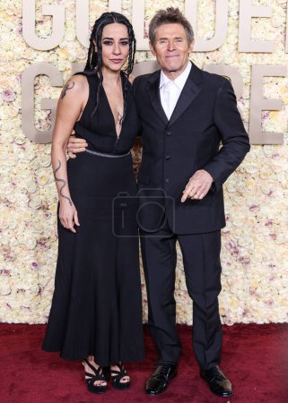 Photo for Giada Colagrande and Willem Dafoe arrive at the 81st Annual Golden Globe Awards held at The Beverly Hilton Hotel on January 7, 2024 in Beverly Hills, Los Angeles, California, United States. - Royalty Free Image
