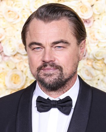 Photo for Leonardo DiCaprio wearing a Giorgio Armani Made-to-Measure tuxedo and Santoni shoes arrives at the 81st Annual Golden Globe Awards held at The Beverly Hilton Hotel on January 7, 2024 in Beverly Hills, Los Angeles, California, United States. - Royalty Free Image
