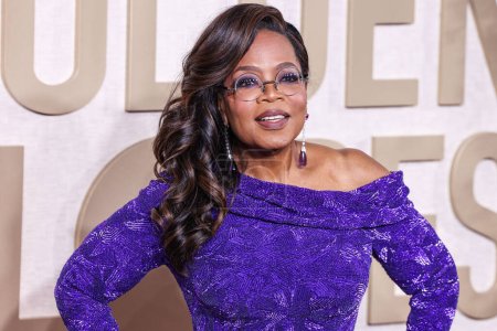Photo for Oprah Winfrey wearing a Louis Vuitton dress, Manolo Blahnik shoes, and Chopard jewels arrives at the 81st Annual Golden Globe Awards held at The Beverly Hilton Hotel on January 7, 2024 in Beverly Hills, Los Angeles, California, United States. - Royalty Free Image