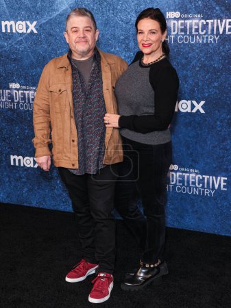 Photo for Patton Oswalt and Meredith Salenger arrive at the Los Angeles Premiere Of HBO's 'True Detective: Night Country' Season 4 held at the Paramount Theatre at Paramount Pictures Studios on January 9, 2024 in Hollywood, Los Angeles, California, USA. - Royalty Free Image