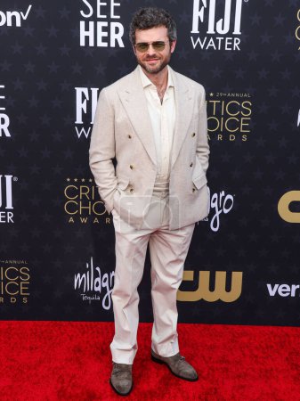 Photo for Alden Ehrenreich arrives at the 29th Annual Critics' Choice Awards held at The Barker Hangar on January 14, 2024 in Santa Monica, Los Angeles, California, United States - Royalty Free Image