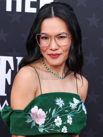 Photo for Ali Wong wearing a Givenchy dress, Brandon Blackwood shoes, and Jared jewels arrives at the 29th Annual Critics' Choice Awards held at The Barker Hangar on January 14, 2024 in Santa Monica, Los Angeles, California, United States. - Royalty Free Image