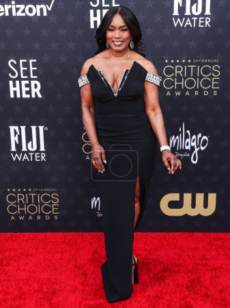 Photo for Angela Bassett wearing Pamella Roland arrives at the 29th Annual Critics' Choice Awards held at The Barker Hangar on January 14, 2024 in Santa Monica, Los Angeles, California, United States. - Royalty Free Image