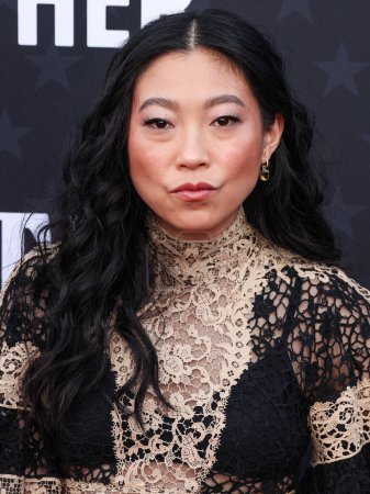 Photo for Awkwafina arrives at the 29th Annual Critics' Choice Awards held at The Barker Hangar on January 14, 2024 in Santa Monica, Los Angeles, California, United States - Royalty Free Image