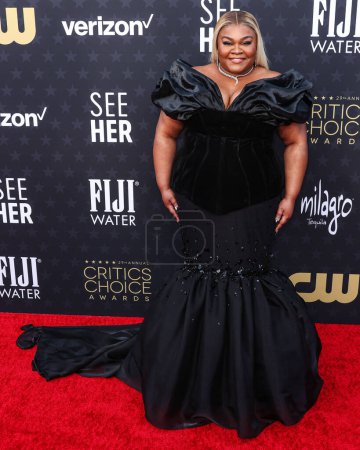 Photo for Da'Vine Joy Randolph wearing custom Jovana Louis with Norman Silverman jewelry arrives at the 29th Annual Critics' Choice Awards held at The Barker Hangar on January 14, 2024 in Santa Monica, Los Angeles, California, United States. - Royalty Free Image