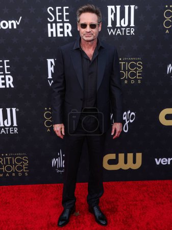 Photo for David Duchovny arrives at the 29th Annual Critics' Choice Awards held at The Barker Hangar on January 14, 2024 in Santa Monica, Los Angeles, California, United States. - Royalty Free Image
