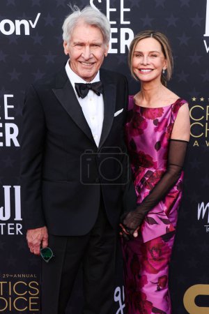 Photo for Harrison Ford and wife Calista Flockhart arrive at the 29th Annual Critics' Choice Awards held at The Barker Hangar on January 14, 2024 in Santa Monica, Los Angeles, California, United States. - Royalty Free Image