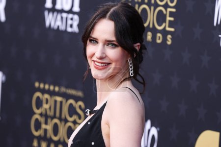 Photo for Rachel Brosnahan wearing Givenchy with jewels from Pomellato and shoes from Andrea Wazen arrives at the 29th Annual Critics' Choice Awards held at The Barker Hangar on January 14, 2024 in Santa Monica, Los Angeles, California, United States. - Royalty Free Image