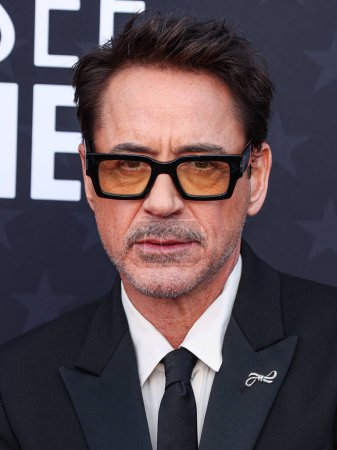 Photo for Robert Downey Jr. wearing Saint Laurent by Anthony Vaccarello arrives at the 29th Annual Critics' Choice Awards held at The Barker Hangar on January 14, 2024 in Santa Monica, Los Angeles, California, United States. - Royalty Free Image