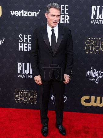 Photo for Rufus Sewell arrives at the 29th Annual Critics' Choice Awards held at The Barker Hangar on January 14, 2024 in Santa Monica, Los Angeles, California, United States - Royalty Free Image