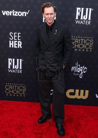 Photo for Tom Hiddleston arrives at the 29th Annual Critics' Choice Awards held at The Barker Hangar on January 14, 2024 in Santa Monica, Los Angeles, California, United States. - Royalty Free Image