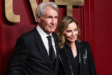 Photo for Harrison Ford and wife Calista Flockhart arrive at Apple TV+'s 75th Annual Primetime Emmy Awards Party held at Mother Wolf on January 15, 2024 in Hollywood, Los Angeles, California, United States. - Royalty Free Image