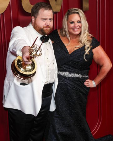 Photo for Paul Walter Hauser and wife Amy Hauser arrive at Apple TV+'s 75th Annual Primetime Emmy Awards Party held at Mother Wolf on January 15, 2024 in Hollywood, Los Angeles, California, United States. - Royalty Free Image