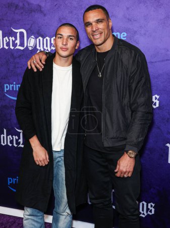 Photo for Nikko Gonzalez and father Tony Gonzalez arrive at the World Premiere Of Amazon Prime Video's 'The Underdoggs' held at The Culver Theater on January 23, 2024 in Culver City, Los Angeles, California, United States. - Royalty Free Image