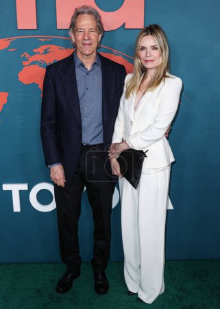 Photo for David E. Kelley and wife Michelle Pfeiffer arrive at the 33rd Annual Environmental Media Association Awards Gala held at Sunset Las Palmas Studios on January 27, 2024 in Hollywood, Los Angeles, California, United States. - Royalty Free Image