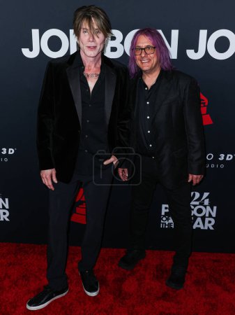 Photo for John Rzeznik and Robert Takac of Goo Goo Dolls arrive at the 2024 MusiCares Person of the Year Honoring Jon Bon Jovi held at the Los Angeles Convention Center on February 2, 2024 in Los Angeles, California, United States. - Royalty Free Image