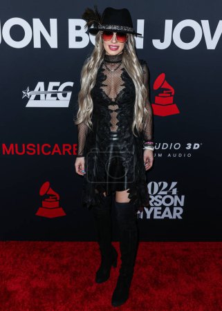 Photo for Orianthi arrives at the 2024 MusiCares Person of the Year Honoring Jon Bon Jovi held at the Los Angeles Convention Center on February 2, 2024 in Los Angeles, California, United States. - Royalty Free Image