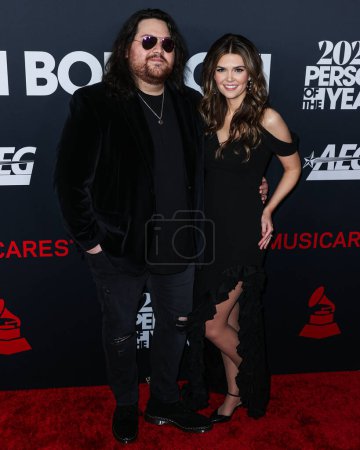 Photo for Wolfgang Van Halen and wife Andraia Allsop arrive at the 2024 MusiCares Person of the Year Honoring Jon Bon Jovi held at the Los Angeles Convention Center on February 2, 2024 in Los Angeles, California, United States. - Royalty Free Image