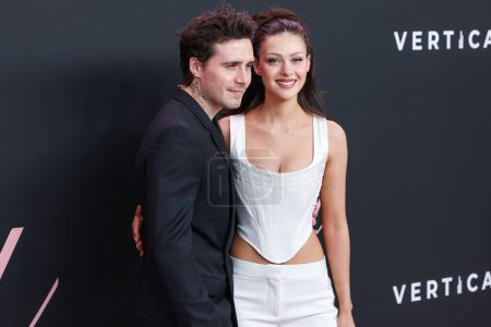 Photo for Brooklyn Peltz Beckham and wife Nicola Peltz Beckham arrive at the Los Angeles Premiere Of Vertical Entertainment's 'Lola' held at the Regency Bruin Theatre on February 3, 2024 in Westwood, Los Angeles, California, United States. - Royalty Free Image