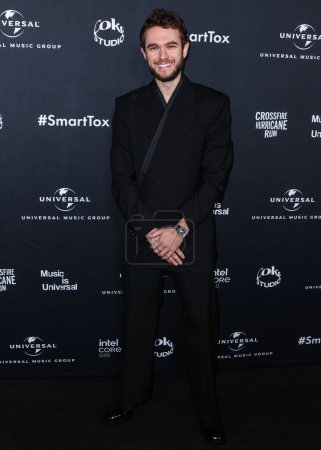 Téléchargez les photos : Zedd arrive à la 66e cérémonie de remise des GRAMMY Awards 2024 d'Universal Music Group qui s'est tenue dans les studios Nya WEST le 4 février 2024 à Hollywood, Los Angeles, Californie, États-Unis. - en image libre de droit