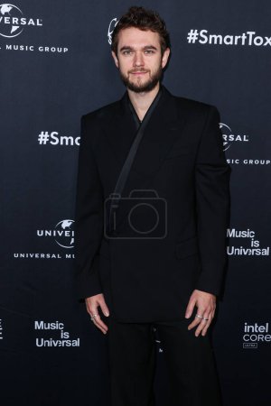 Téléchargez les photos : Zedd arrive à la 66e cérémonie de remise des GRAMMY Awards 2024 d'Universal Music Group qui s'est tenue dans les studios Nya WEST le 4 février 2024 à Hollywood, Los Angeles, Californie, États-Unis. - en image libre de droit