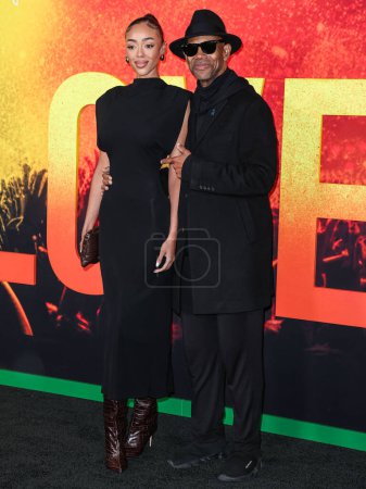 Téléchargez les photos : Bella Harris et son père Jimmy Jam arrivent à la première de "Bob Marley : One Love" au Regency Village Theatre le 6 février 2024 à Westwood, Los Angeles, Californie, États-Unis.. - en image libre de droit