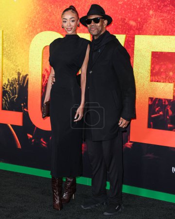 Photo for Bella Harris and father Jimmy Jam arrive at the Los Angeles Premiere Of Paramount Pictures' 'Bob Marley: One Love' held at the Regency Village Theatre on February 6, 2024 in Westwood, Los Angeles, California, United States. - Royalty Free Image