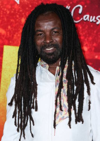 Photo for Rocky Dawuni arrives at the Los Angeles Premiere Of Paramount Pictures' 'Bob Marley: One Love' held at the Regency Village Theatre on February 6, 2024 in Westwood, Los Angeles, California, United States. - Royalty Free Image