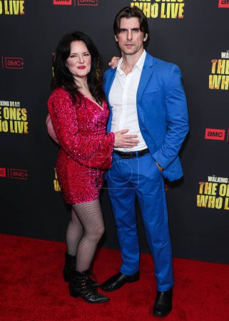 Photo for Liz Stewart and Cooper Barnes arrive at the Los Angeles Premiere Of AMC+'s 'The Walking Dead: The Ones Who Live' Season 1 held at the Linwood Dunn Theater at the Pickford Center for Motion Picture Study on February 7, 2024 in Hollywood, Los Angeles - Royalty Free Image