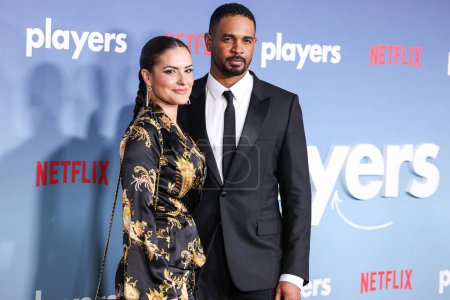 Photo for Samara Saraiva and husband Damon Wayans Jr. arrive at the Los Angeles Premiere Of Netflix's 'Players' held at The Egyptian Theatre Hollywood on February 8, 2024 in Hollywood, Los Angeles, California, United States. - Royalty Free Image