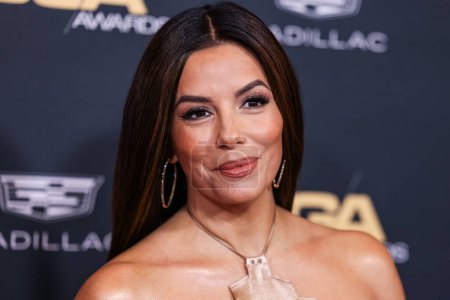 Photo for Eva Longoria wearing Alberta Ferretti SS24 RTW arrives at the 76th Annual Directors Guild Of America (DGA) Awards held at The Beverly Hilton Hotel on February 10, 2024 in Beverly Hills, Los Angeles, California, United States. - Royalty Free Image
