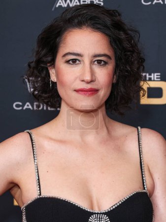 Photo for Ilana Glazer wearing Rebecca Vallance arrives at the 76th Annual Directors Guild Of America (DGA) Awards held at The Beverly Hilton Hotel on February 10, 2024 in Beverly Hills, Los Angeles, California, United States. - Royalty Free Image
