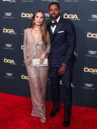 Photo for Nina Senicar and husband Jay Ellis arrive at the 76th Annual Directors Guild Of America (DGA) Awards held at The Beverly Hilton Hotel on February 10, 2024 in Beverly Hills, Los Angeles, California, United States. - Royalty Free Image