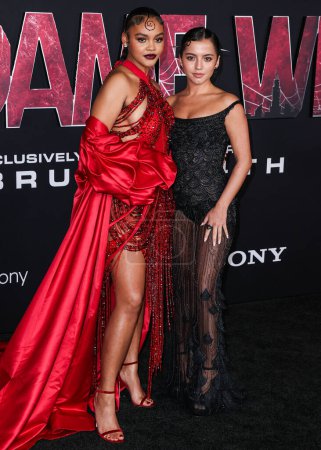 Photo for Celeste O'Connor and Isabela Moner Merced arrive at the World Premiere Of Columbia Pictures' 'Madame Web' held at the Regency Village Theatre on February 12, 2024 in Westwood, Los Angeles, California, United States. - Royalty Free Image