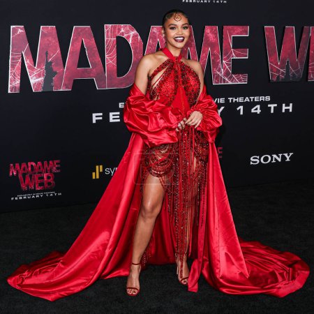 Photo for Celeste O'Connor wearing a Gert-Johan Coetzee dress and Jimmy Choo shoes arrives at the World Premiere Of Columbia Pictures' 'Madame Web' held at the Regency Village Theatre on February 12, 2024 in Westwood, Los Angeles, California, United States. - Royalty Free Image
